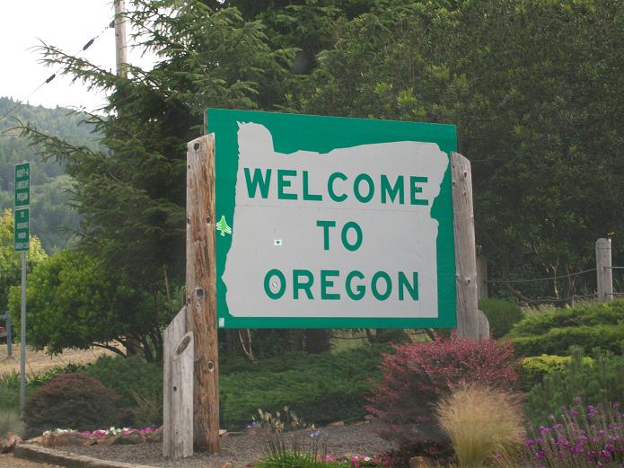 sign reading Welcome to Oregon